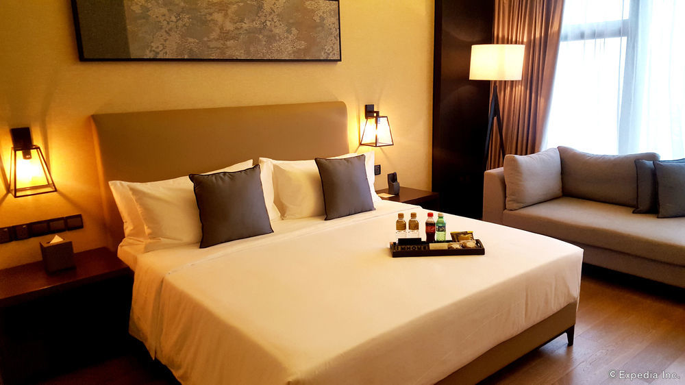 I'M Hotel Makati City Kültér fotó A room at the hotel