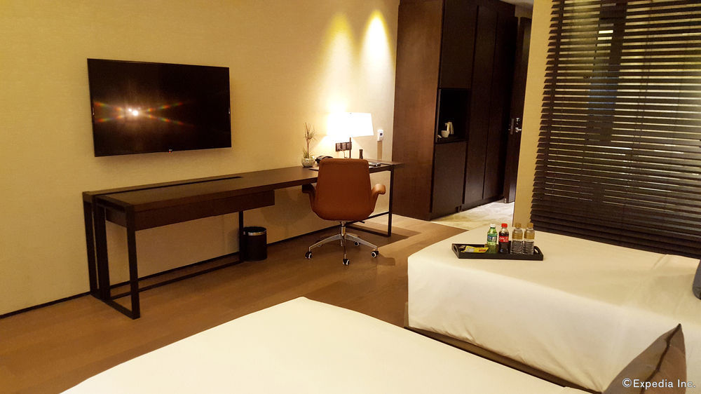 I'M Hotel Makati City Kültér fotó A room at the hotel